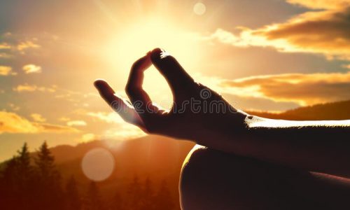 close-up-hand-meditation-pose-close-up-hand-meditation-pose-sunset-mountains-206323180